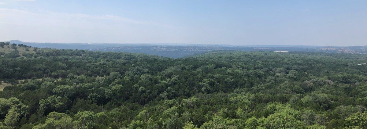 View over the wooded hills surrounding Senna Hills